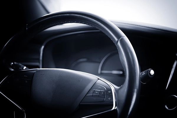 Black steering wheel in vehicle interior
