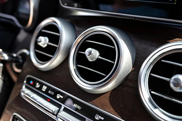 Three A/C vents in luxury car interior